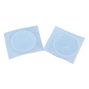 Product image of the LinkSticker by LinkProducts. A white sticker with NFC antenna on a white backdrop.